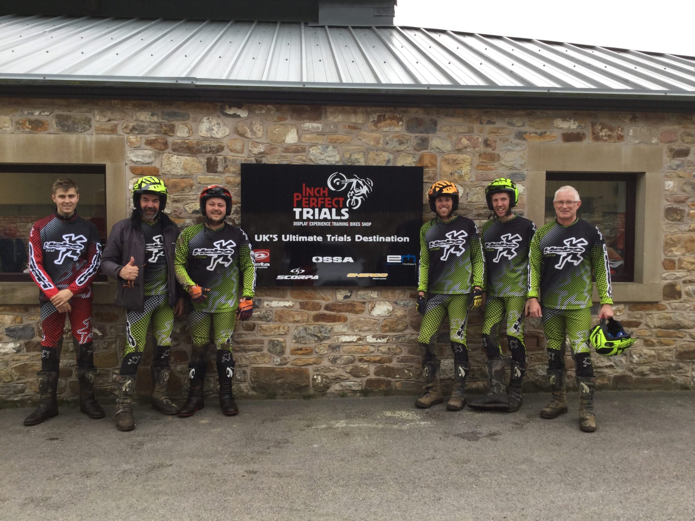 a group of people standing in front of a building