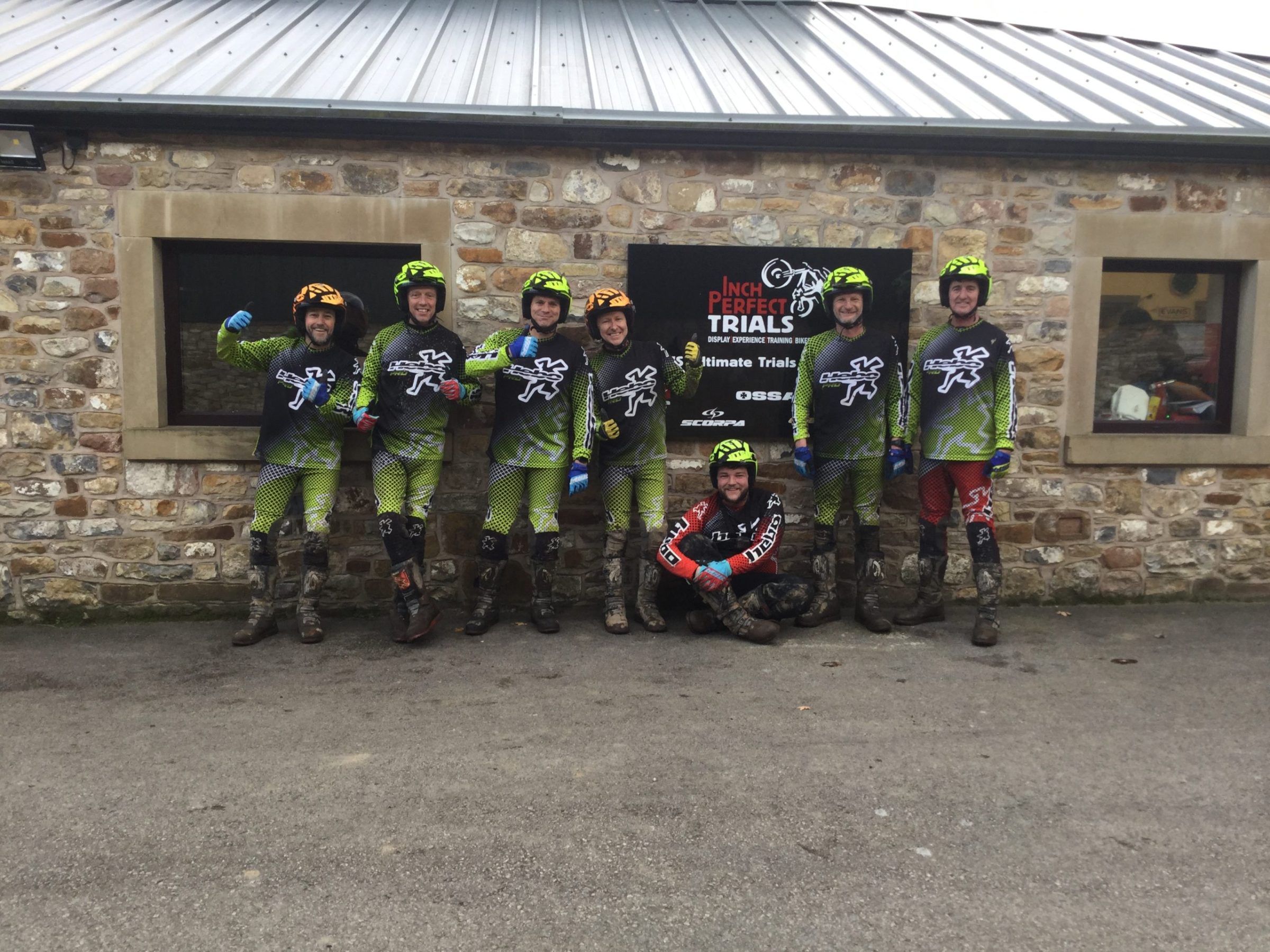 a group of people standing in front of a building