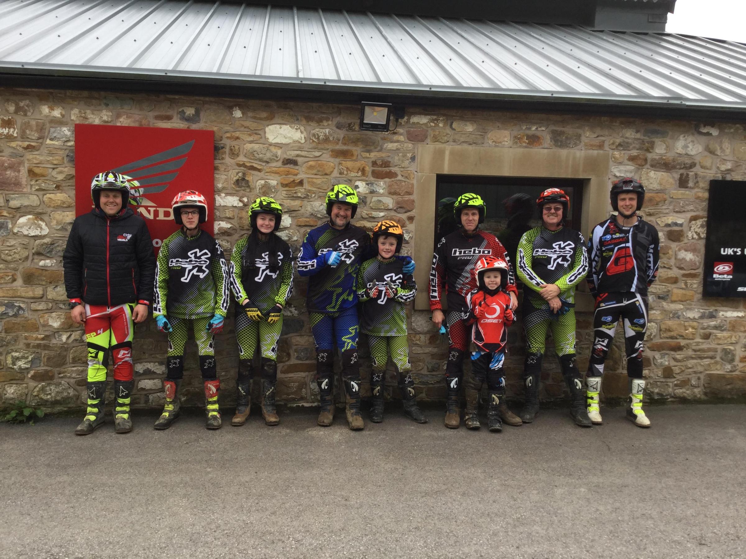 a group of people posing for the camera