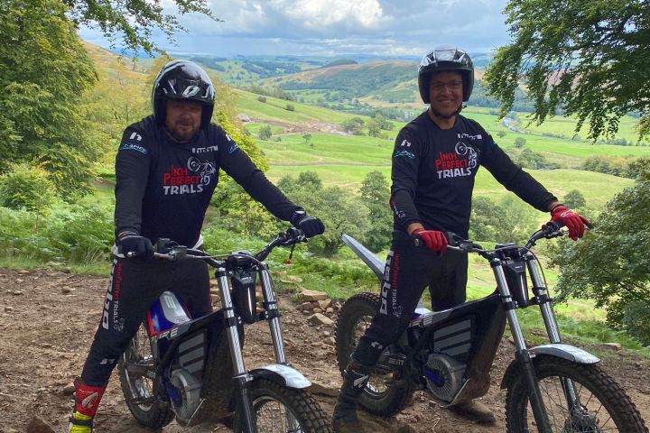 a couple of people that are sitting on a motorcycle