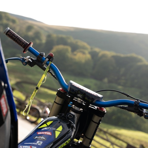 a person riding on the back of a motorcycle