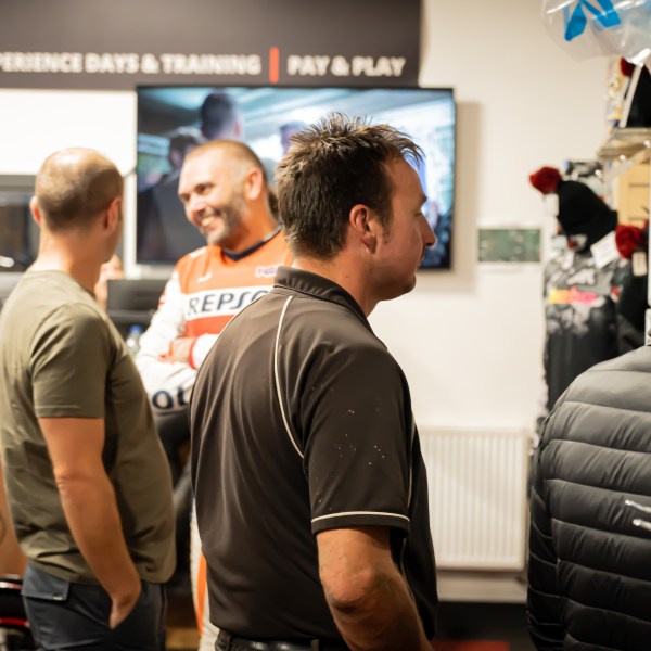 a group of people standing in a room