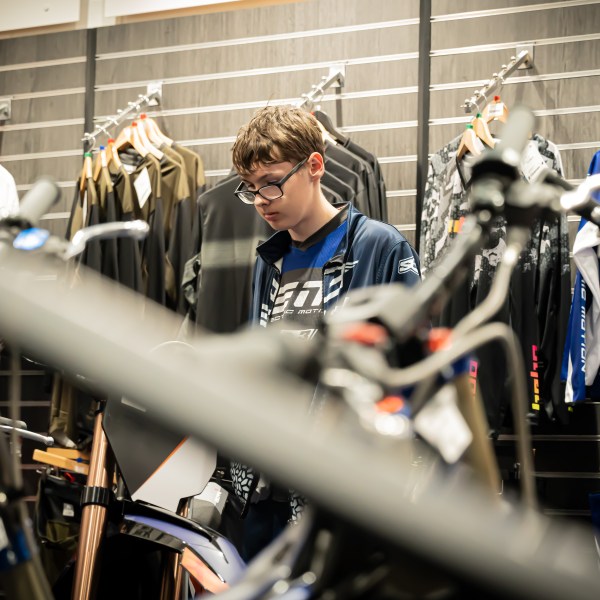 a group of people on a motorcycle