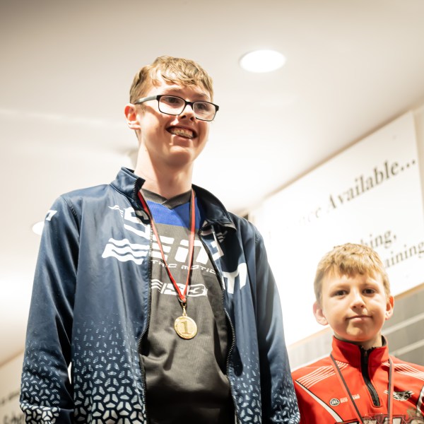 a person wearing a suit and tie