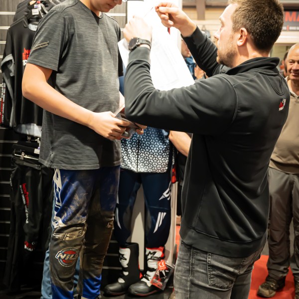 a group of people standing in a room