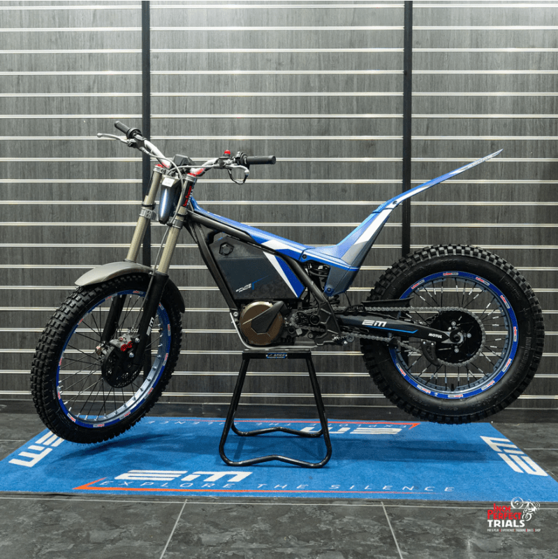 a bicycle parked on the side of a building