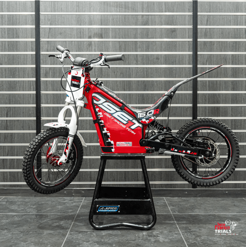 a bicycle parked on the side of a building