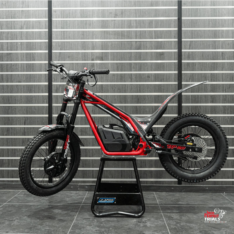 a bicycle parked on the side of a building