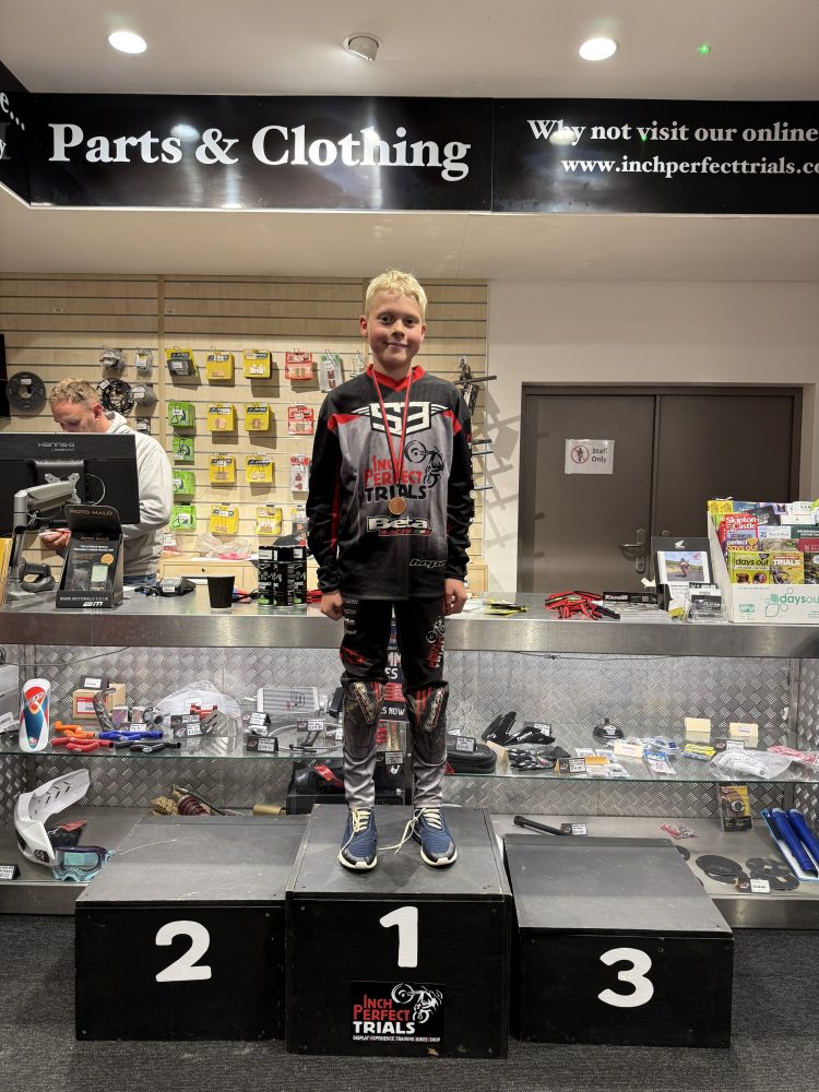 a man standing in front of a store
